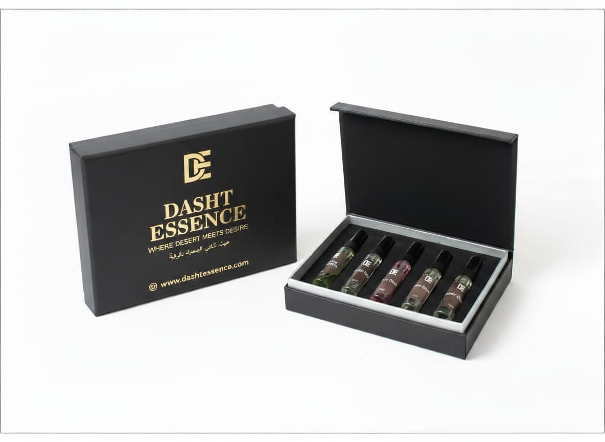 Dasht Essence perfume tester with its elegant black and gold packaging. A 5 luxurious 5ml fragrance where desert meets desire